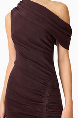 Brunette model wearing the Simone One Shoulder Maxi Dress in Chocolate Brown detail shot 