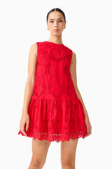 Brunette model wearing the Giovanna Shift Mini Dress in Red close up shot