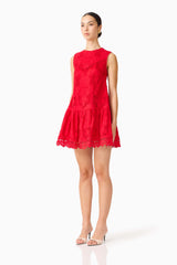 Brunette model wearing the Giovanna Shift Mini Dress in Red side shot