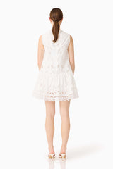 Brunette model wearing the Giovanna Shift Mini Dress in White Back shot