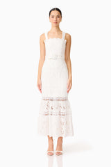 Brunette model wearing the Giovanna Fit & Flare Maxi Dress in White front shot
