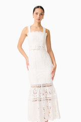 Brunette model wearing the Giovanna Fit & Flare Maxi Dress in White close up shot