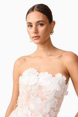Brunette model wearing Selene Maxi Tiered 3D Dress in White close up shot