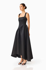 Brunette model wearing the Ruelle A-Line Maxi Dress in Black side shot