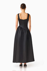 Brunette model wearing the Ruelle A-Line Maxi Dress in Black back shot