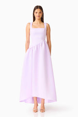 Brunette model wearing the Ruelle A-Line Maxi Dress in Purple front shot 