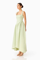 Brunette model wearing the Ruelle A-Line Maxi Dress in Sage Green side shot 