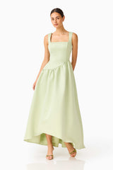 Brunette model wearing the Ruelle A-Line Maxi Dress in Sage Green posed shot 