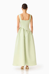 Brunette model wearing the Ruelle A-Line Maxi Dress in Sage Green back shot 