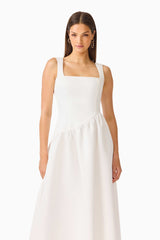 Brunette model wearing the Ruelle A-Line Maxi Dress in Pearl White close up shot 