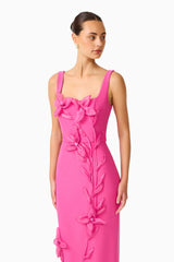 Brunette model wearing the Ilaria Floral Midi Dress in Pink close up shot