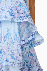 Brunette model wearing the Armani Tiered Maxi Dress in Baby Blue Floral detail shot