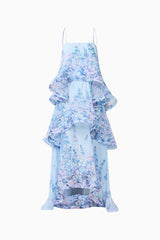 Brunette model wearing the Tilly Tiered Maxi Dress in Blue Floral ghost shot
