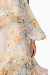 Brunette model wearing the Armani Tiered Maxi Dress in Yellow Floral detail shot 