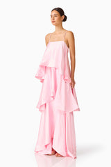 Brunette model wearing the Tilly Tiered Maxi Dress in Pale Pink side shot