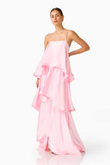 Brunette model wearing the Tilly Tiered Maxi Dress in Pale Pink posed shot