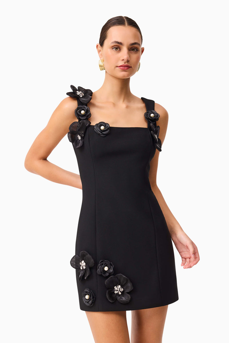 Brunette model wearing Chantelle Floral Mini Dress in Black close up posed shot