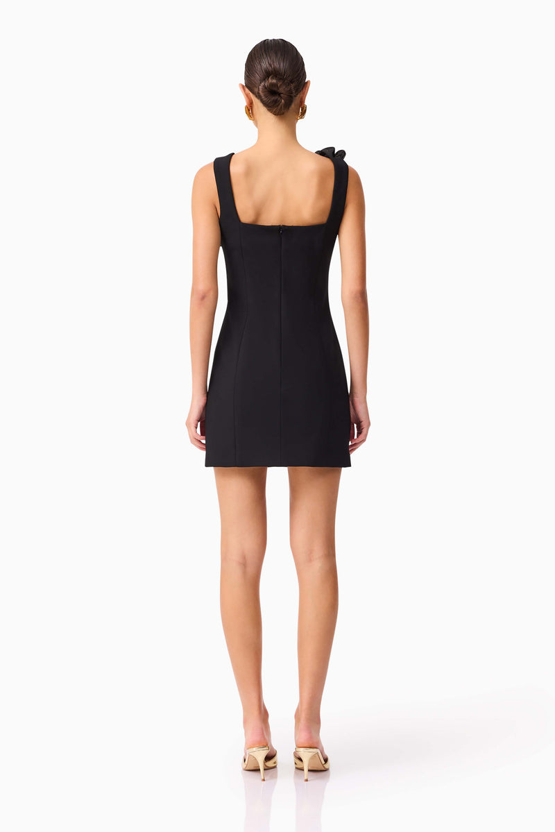 Brunette model wearing Chantelle Floral Mini Dress in Black back shot