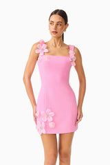 Brunette model wearing the Chantelle Floral Mini Dress in Pink close up shot
