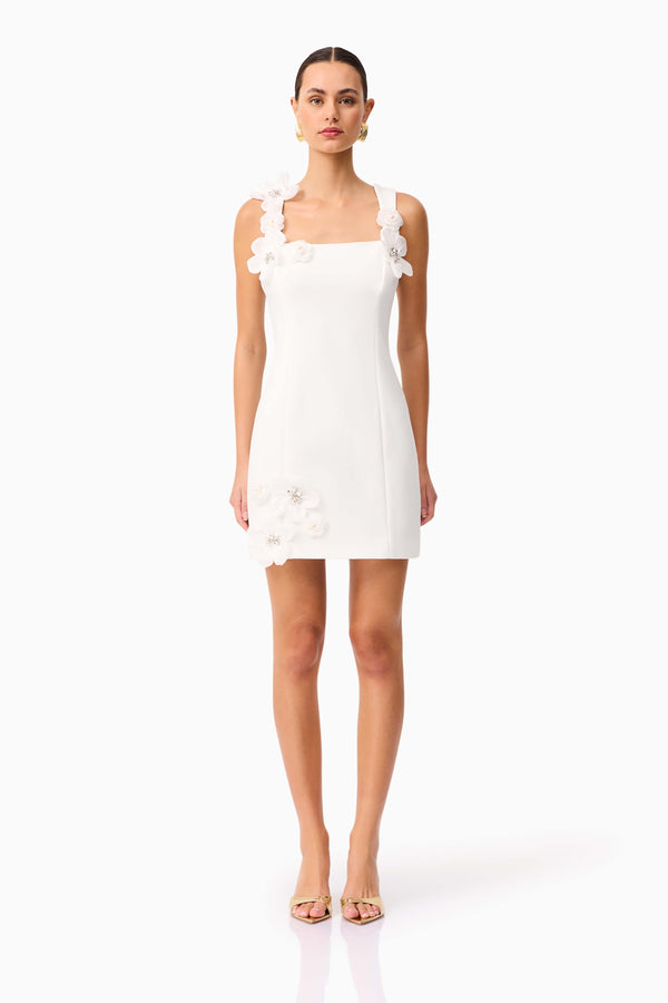 Brunette model wearing Chantelle Floral Mini Dress in White front shot