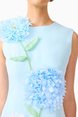 Blonde model wearing the Buttercup Embroidered Mini Dress in Blue detail shot