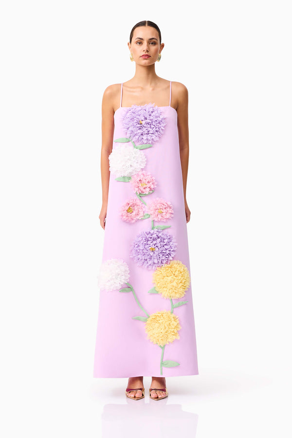 Brunette model wearing Buttercup Embroidered Maxi Dress in Purple front shot