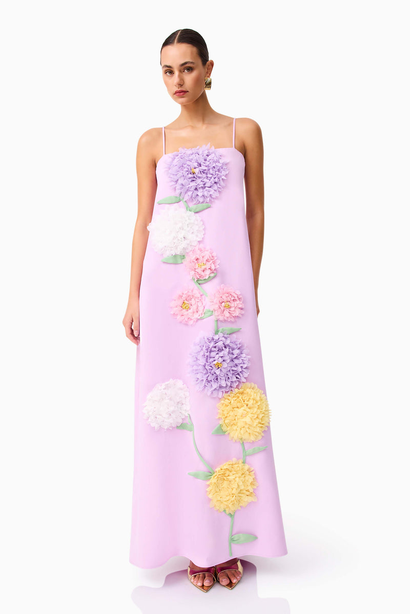 Brunette model wearing Buttercup Embroidered Maxi Dress in Purple posed shot