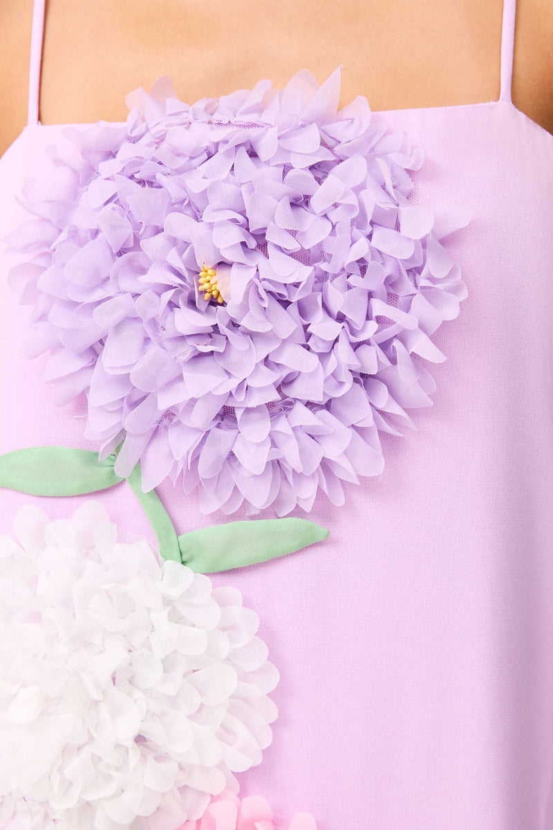 Brunette model wearing Buttercup Embroidered Maxi Dress in Purple detail shot