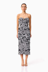 Brunette model wearing Roseate Strapless Midi Dress in Black front shot