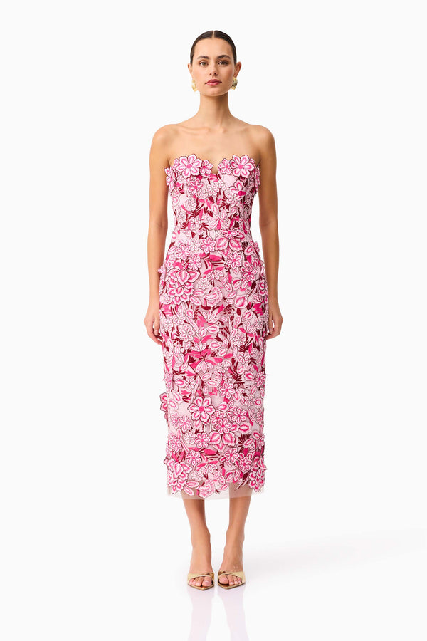 Brunette model wearing Roseate Strapless Midi Dress in Pink front shot