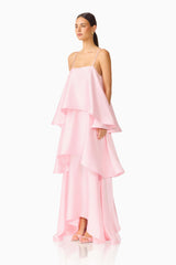 Brunette model wearing the Tilly Tiered Maxi Dress in Blush Pink side shot