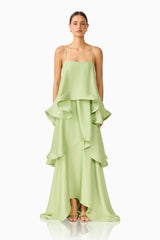 Model wears Tilly Tiered Maxi Dress in Sage Green full body front shot with loose fit tiers and spaghetti straps