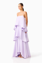 Brunette model wearing the Tilly Tiered Maxi Dress in Purple side shot