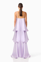 Brunette model wearing the Tilly Tiered Maxi Dress in Purple back shot