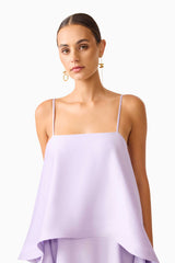 Brunette model wearing the Tilly Tiered Maxi Dress in Purple close up shot