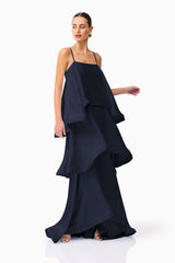 Tilly Tiered Maxi Dress in Navy with a tiered relaxed silhouette & square neckline posed looking away shot