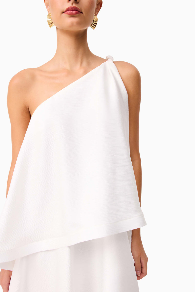 Brunette model wearing Tilly One Shoulder Maxi Dress in White detail shot