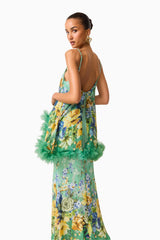 Blonde model wearing the Jamie Tiered Maxi Dress in Green Floral back posed shot