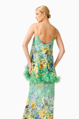 Blonde model wearing the Jamie Tiered Maxi Dress in Green Floral back close up shot