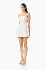 Gemma Floral Mini Dress in White with a strapless neckline, tulip skirt & floral appliques side shot