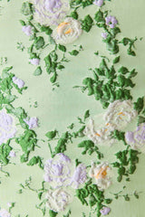 Christina Jacquard Mini Dress In Green Floral with square neckline and jacquard fabrication detail shot