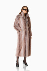 Kinley Faux Fur Coat in Brown with collared neckline and long sleeves side posed shot