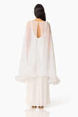 Ellie Cape Maxi Dress in White with a cape with floral trim detailing & column silhouette & back zipper back shot