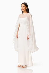 Ellie Cape Maxi Dress in White with a cape with floral trim detailing & column silhouette side shot