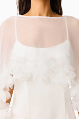 Ellie Cape Maxi Dress in White with a cape with floral trim detailing & column silhouette deail shot