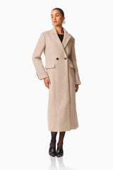 Paris Trench Coat in Beige with long sleeves & v-neckline posed looking away shot