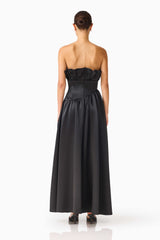 Brunette model wearing the Laurel Sleeveless Maxi Dress in Black Pearl White back shot 