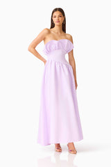 Brunette model wearing the Laurel Sleeveless Maxi Dress in Purple Satin posed hand on hip shot