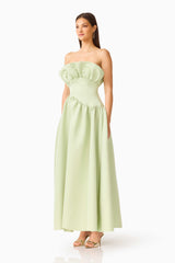 Brunette model wearing the Laurel Sleeveless Maxi Dress in Sage Green side shot 