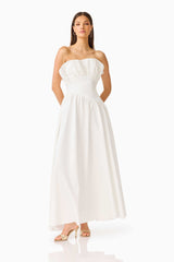 Brunette model wearing the Laurel Sleeveless Maxi Dress in Pearl White posed shot 